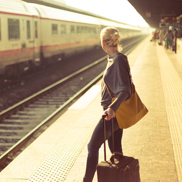 istock Lady waiting at the railway station. 500924877