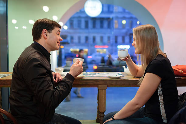 istock Man and woman chatting over coffee 500924905