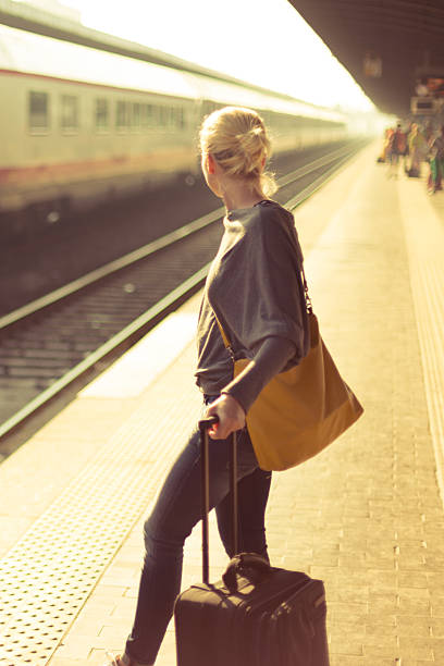 istock Lady waiting at the railway station. 500925339