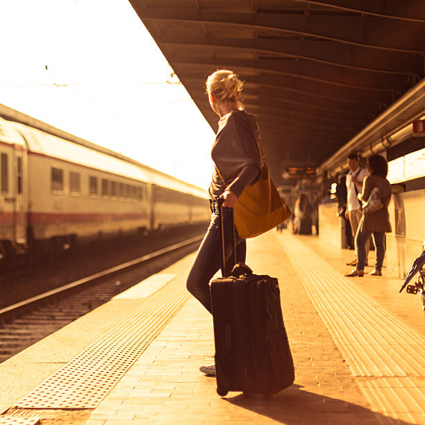 istock Lady waiting at the railway station. 500925401