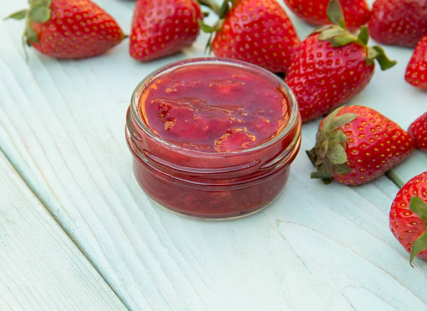 istock strawberry jam in the bank is on the table 500925683