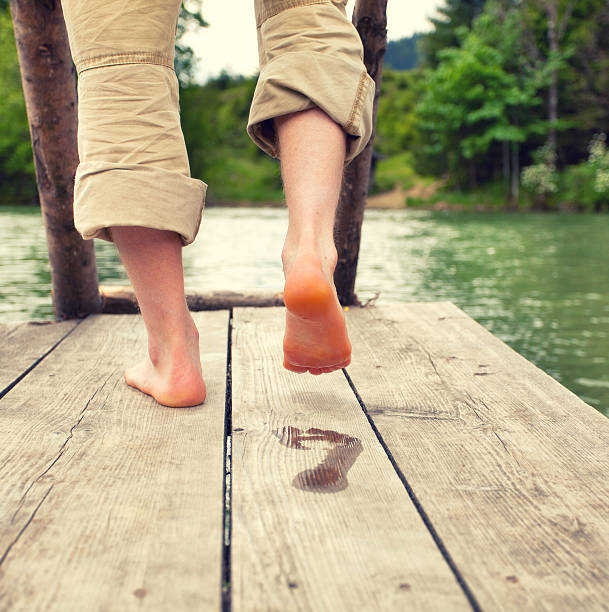 istock water footprint on footbridge 500926011