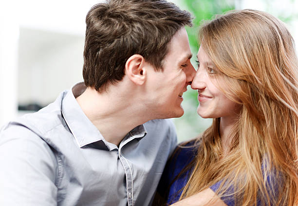 istock Very attractive young couple flirting on a sofa 500926033