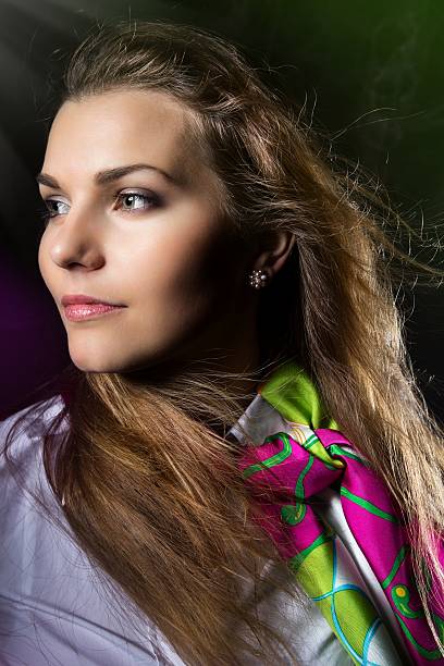 istock Young pretty woman with flying scarf. 500926447