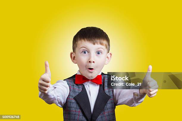 Excited Surprised Little Boy With Thumb Up Gesture Isolated Ove Stock Photo - Download Image Now