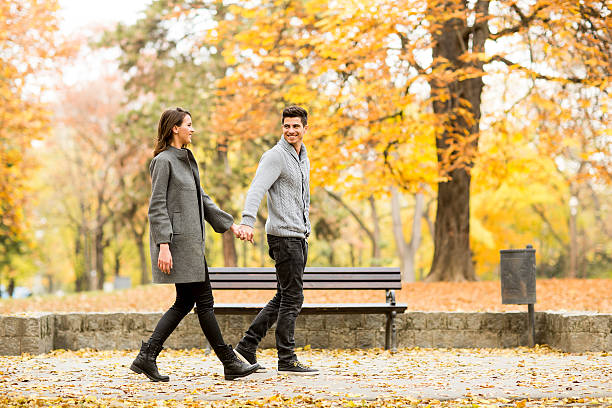 istock Loving couple in the autumn park 500926962
