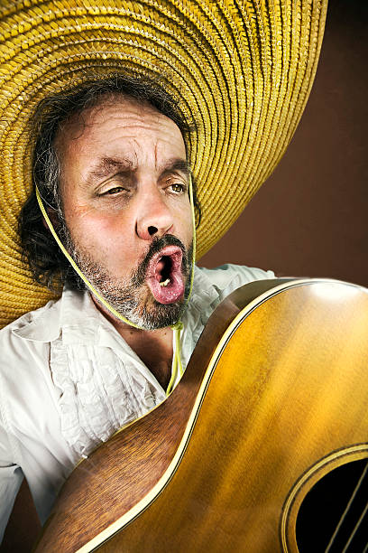istock Mexican playing guitar and singing a song 500926985