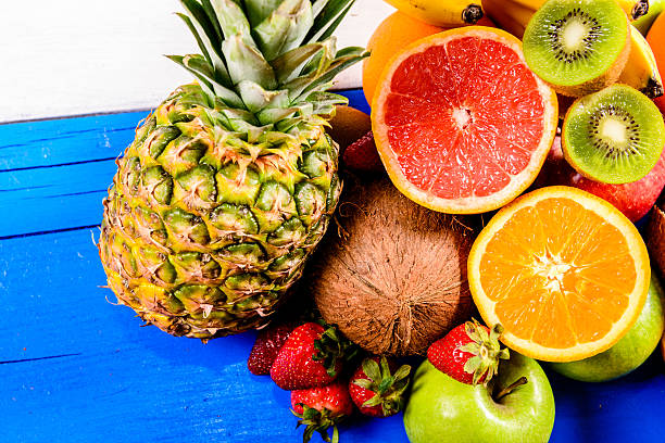 istock Pineapple, grapefruit, strawberry, kiwi, orange, bananas, apples 500926987