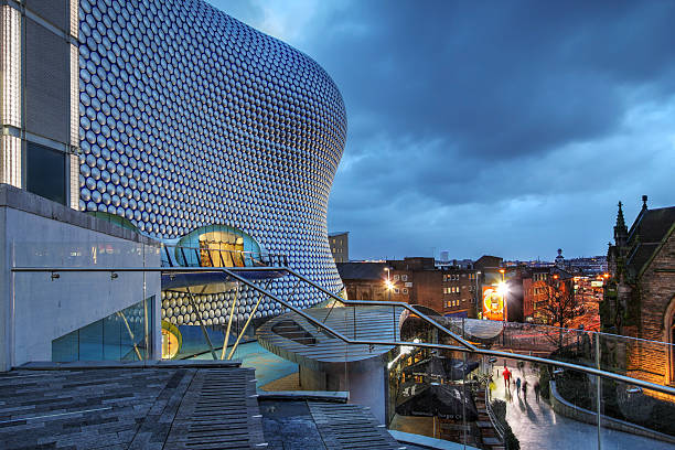 Birmingham, United Kingdom Birmingham, UK - January 30, 2013: Night scene in downtown Birmingham, UK with the Selfridges Department Store overlooking the city' skyline. bullring stock pictures, royalty-free photos & images