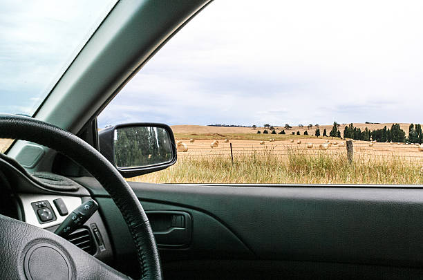 View of country paddocks from car window stock photo