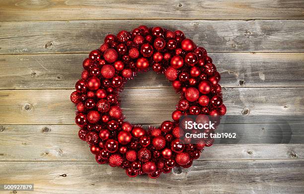 Large Christmas Wreath On Faded Wood Stock Photo - Download Image Now - Wreath, Above, Christmas Ornament