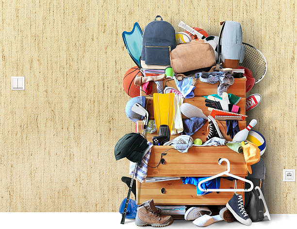 Mess, dresser with scattered clothes stock photo