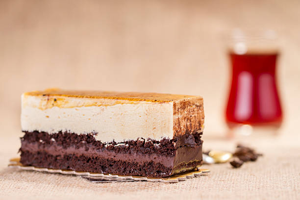 Yellow Lemon cake slice on straw sack table