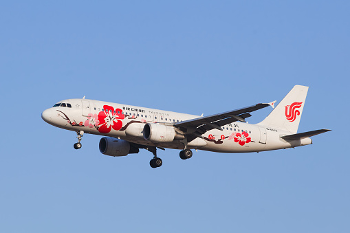 Beijing, China - March 13, 2015: BEIJING-MARCH 13, 2015. Air China B-6610 Airbus A-320-200 landing at BCIA. As of July 2013, a total of 5,677 Airbus A320 family aircraft have been delivered worldwide, of which 5,481 are in service.