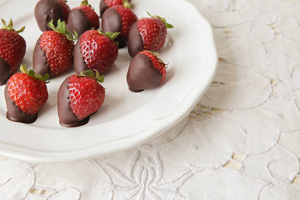 istock Fresh strawberries dipped in dark chocolate ,copy space backgrou 500932848