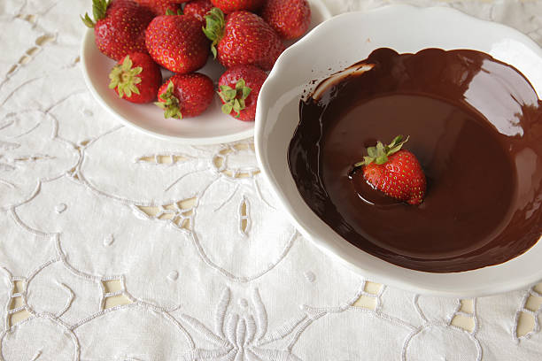 istock Fresh strawberries dipped in dark chocolate ,copy space backgrou 500933152