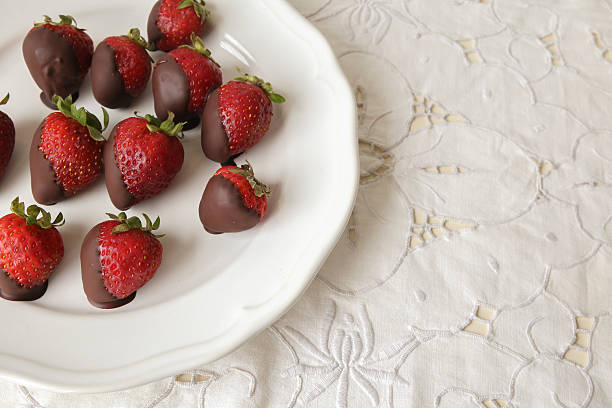 istock Fresh strawberries dipped in dark chocolate ,copy space backgrou 500933416