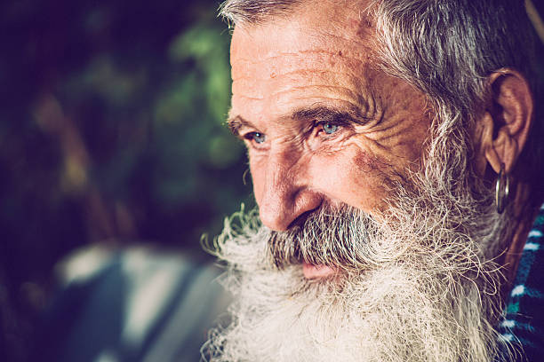 istock Old Happy Man with Extremely Long Beard Outdoors, Close-up 500938144