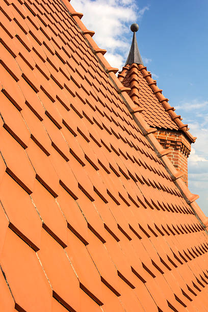 istock Little brick tower and a new roof 500938576