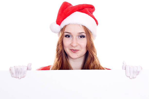 istock Female Santa with a banner 500941295