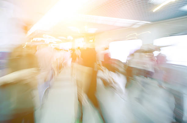 istock group of blur passengers, walking at subway station. 500942485