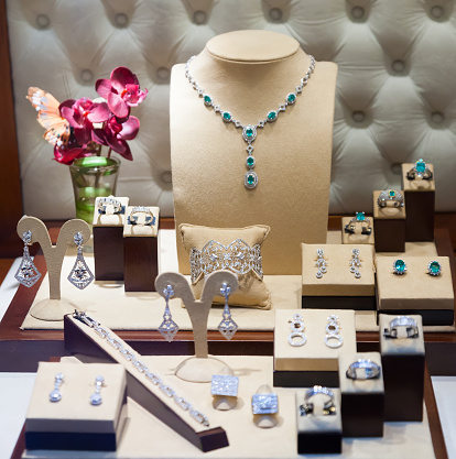 silver jewelry at showcase of jewelry store
