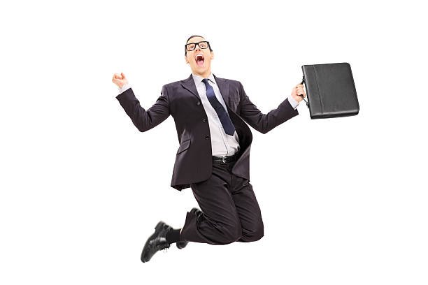 istock Businessman with briefcase jumping out of joy 500945415