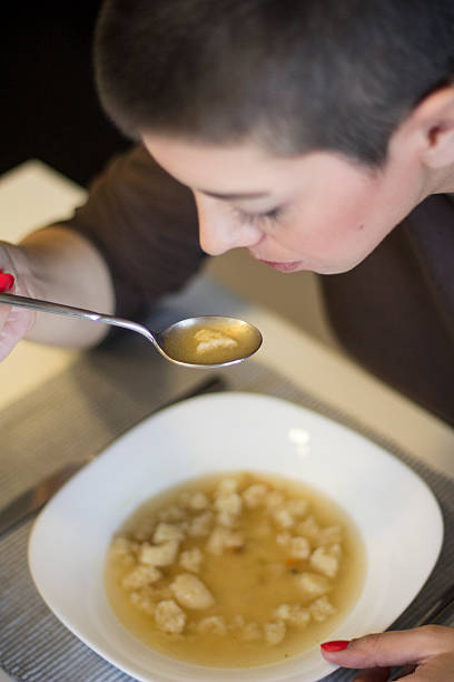 istock Girl eating soup. 500946299