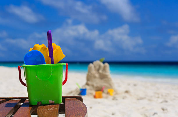 istock kids toys on tropical beach 500946937