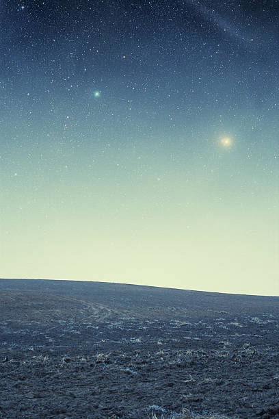 istock field at night. Elements of this image furnished by NASA 500947829