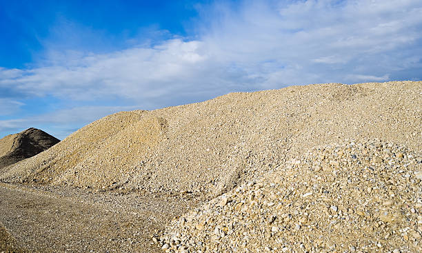 istock crushed stone and gravel on a construction site 500947887