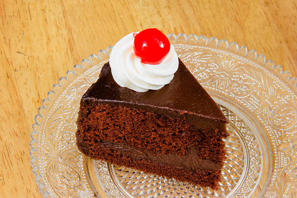 istock chocolate cake with red Jelly on top 500948847
