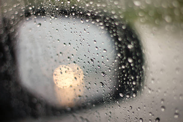 istock Stock Photo:  close up rain on a car mirror 500955308