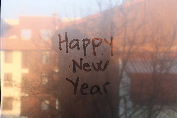 istock Happy New Year text written on the glass 500955994