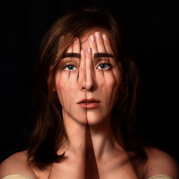 Surreal portrait of a young girl.Double exposure Surreal portrait of a young girl covering  her face and eyes with  her hands.Double exposure falsehood stock pictures, royalty-free photos & images