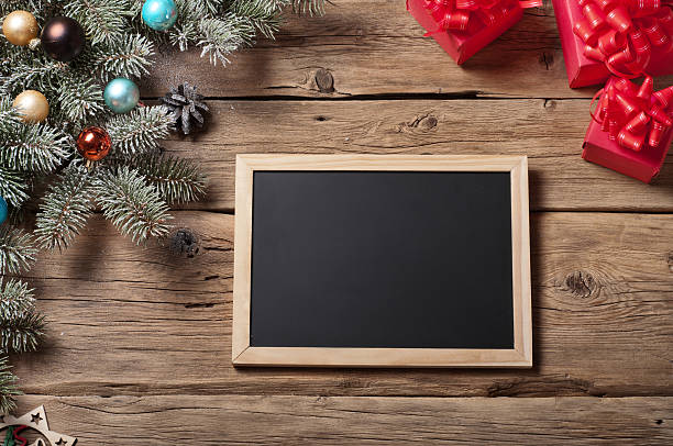 istock Boards for chalk with branch Christmas tree and Christmas gift 500958292