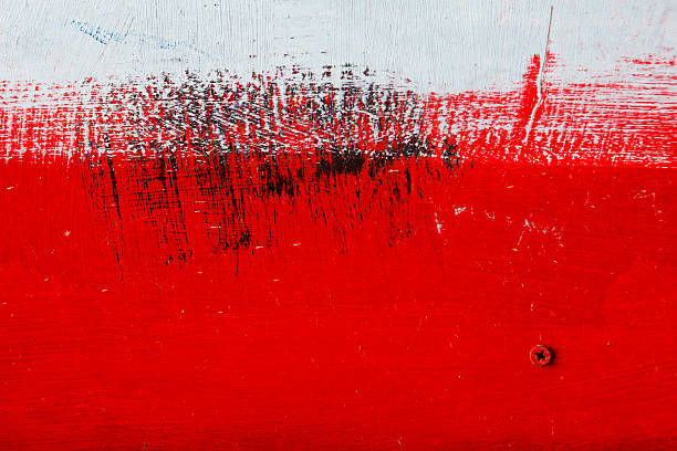 Brushstroke - black,  white, red acrylic paint  on  metal sur stock photo