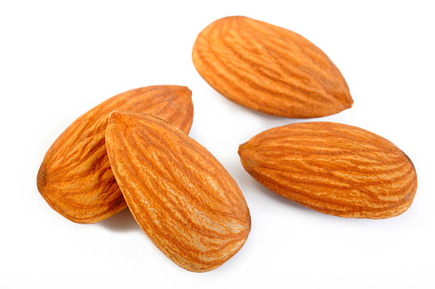 istock raw almond nuts isolated on white background 500963186