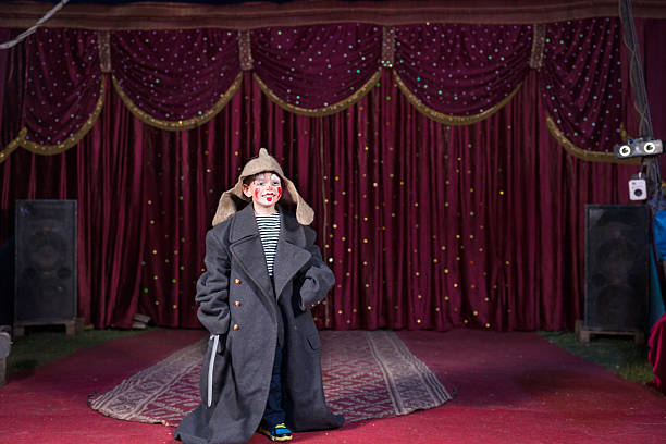 istock Boy Wearing Costume Holding Sword on Stage 500964486