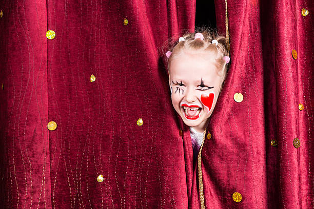 istock Pretty excited little blond girl on stage 500965134