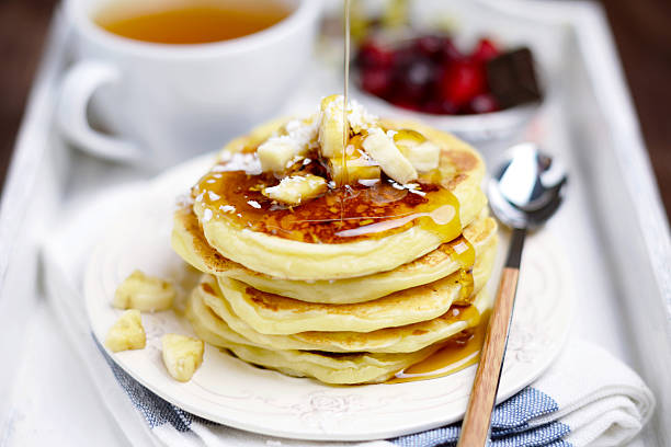 istock Banana pancakes with maple syrup 500965580