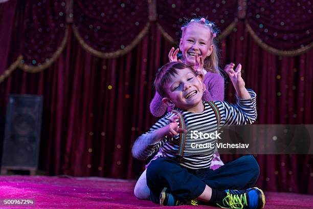 Two Funny Children Acting As Monsters On Stage Stock Photo - Download Image Now - Child, Stage - Performance Space, Acting - Performance