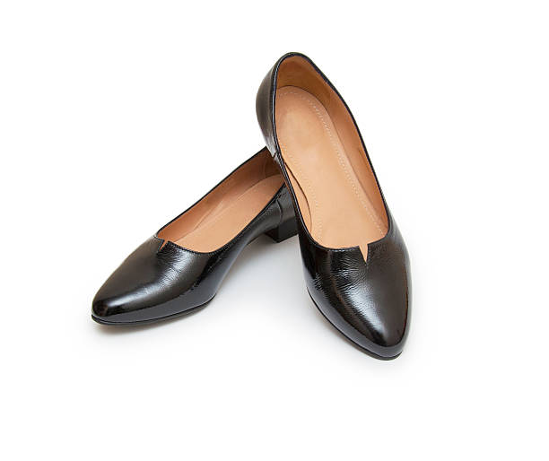 istock women shoes on white background 500989530
