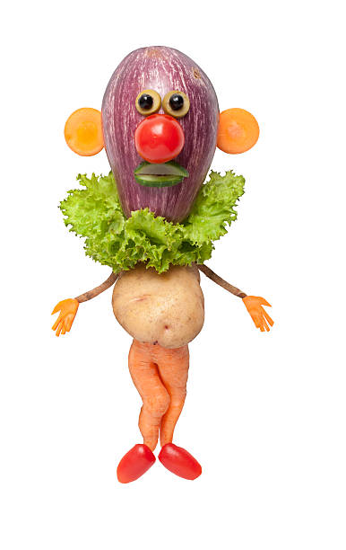 istock Funny clown made of vegetables on isolated background 500994290