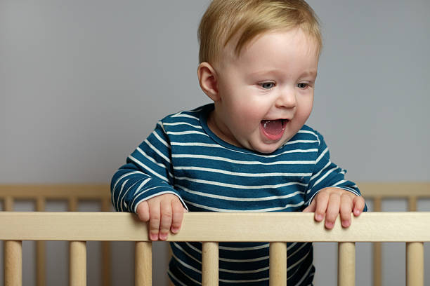 istock Baby in the crib 500995250
