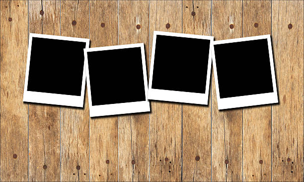 istock Old picture frame on wood background 500996558