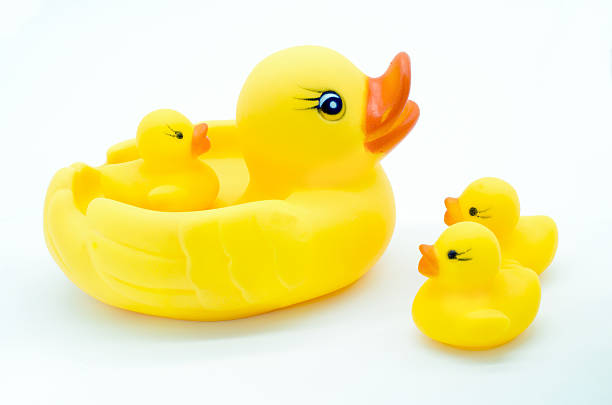 istock Rubber yellow duck toy on white background 500998394