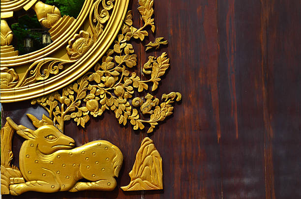 Golden deer on temple door