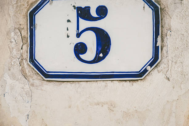 istock Handmade House Number 5 on Old Italian Wall 501002346