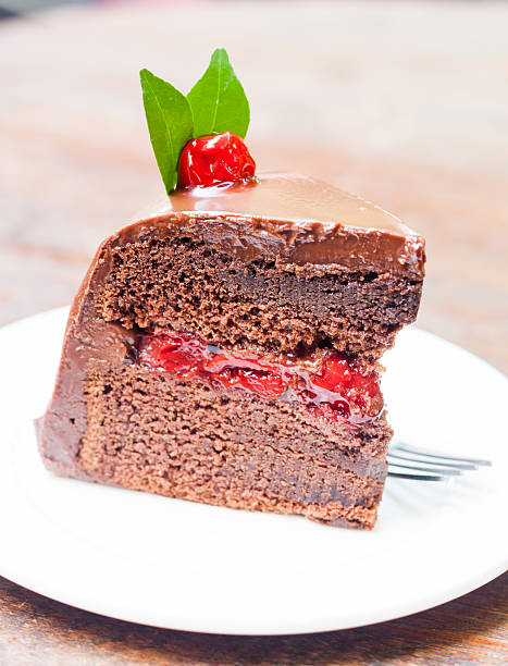 istock Piece of chocolate cake on white plate 501002780